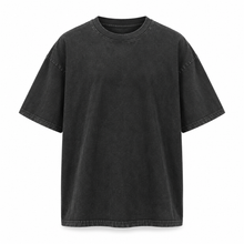 Washed black relaxed drop-shoulder T-shirt on a pure white background